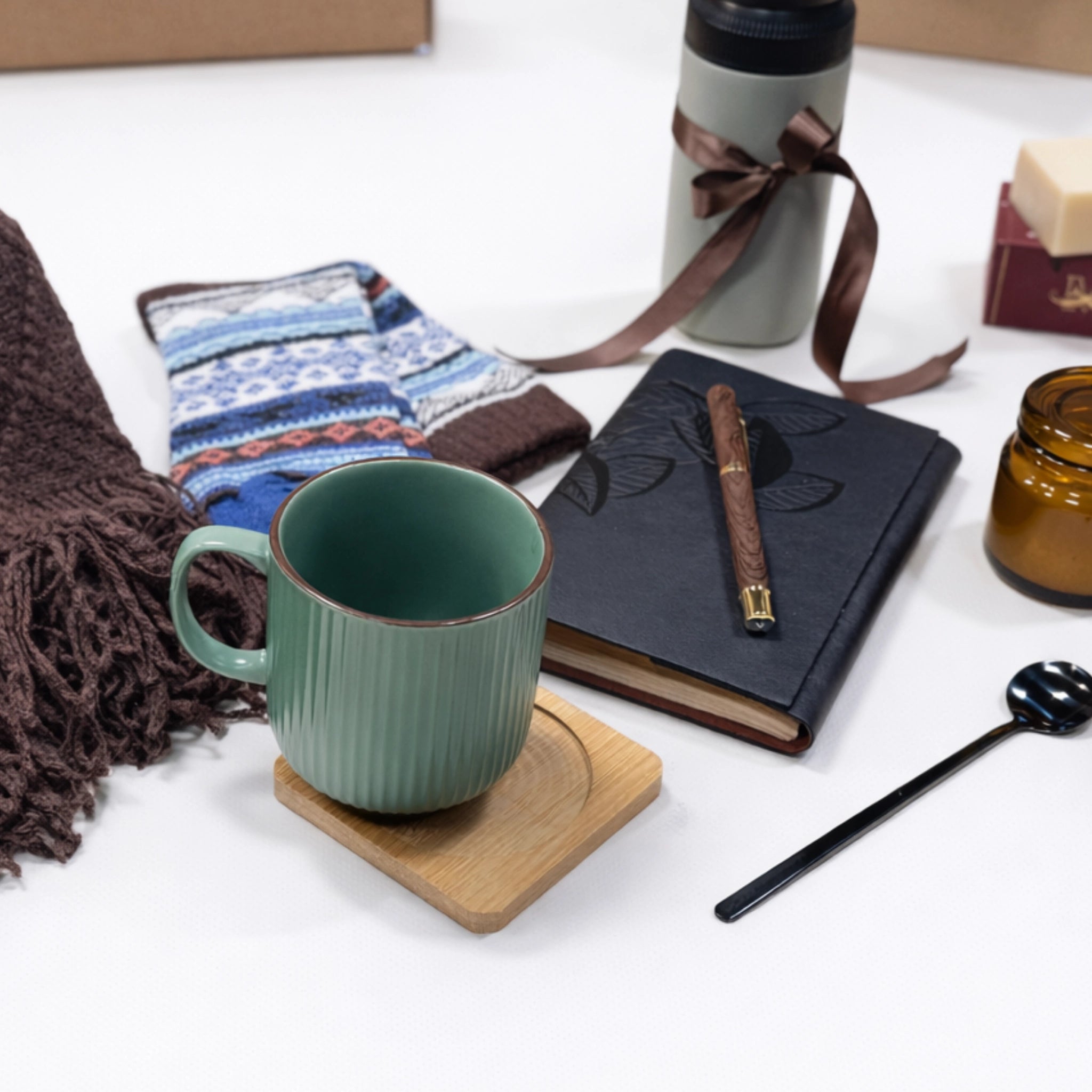 Sophisticated gift box for him featuring premium accessories and gourmet treats, hand-packed by Arinna Gifts in Dallas
