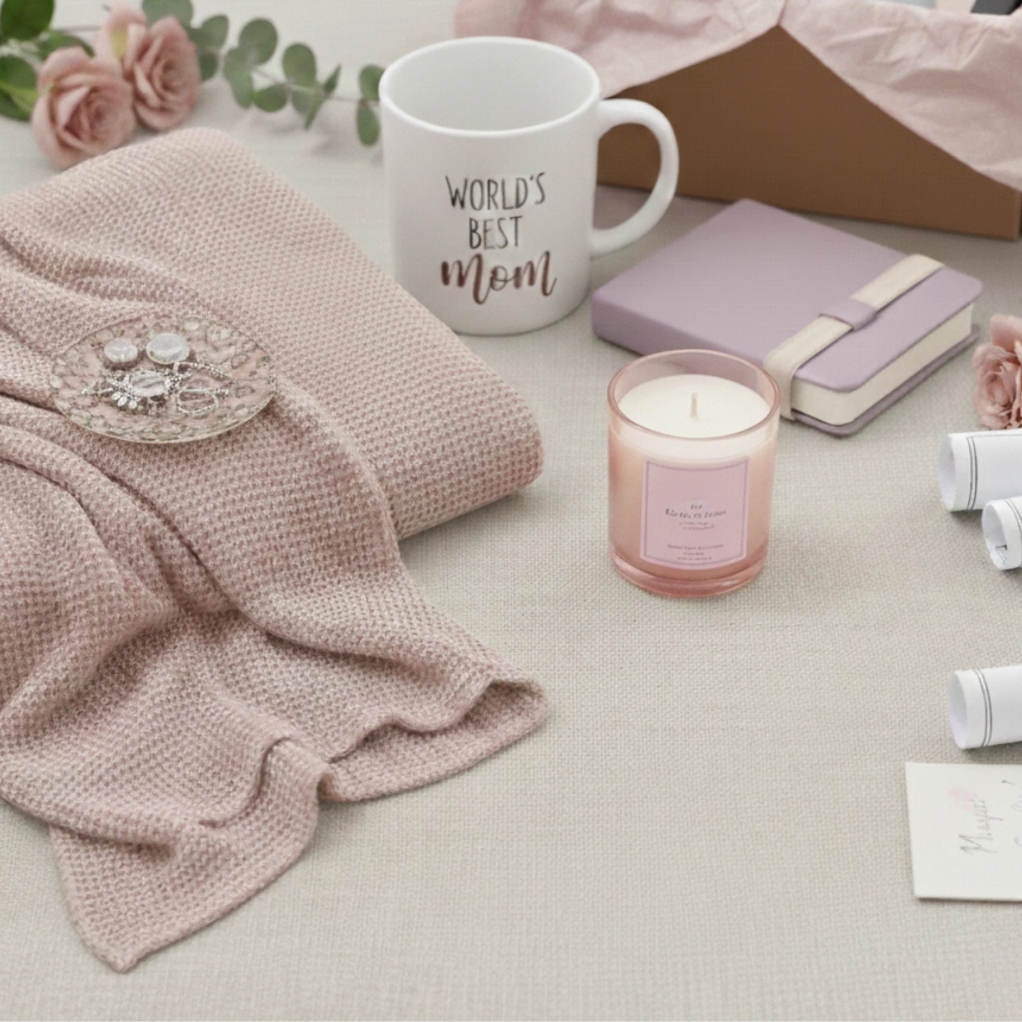 An elegant Mother's Day gift basket featuring luxury self-care products and thoughtful keepsakes to honor mothers