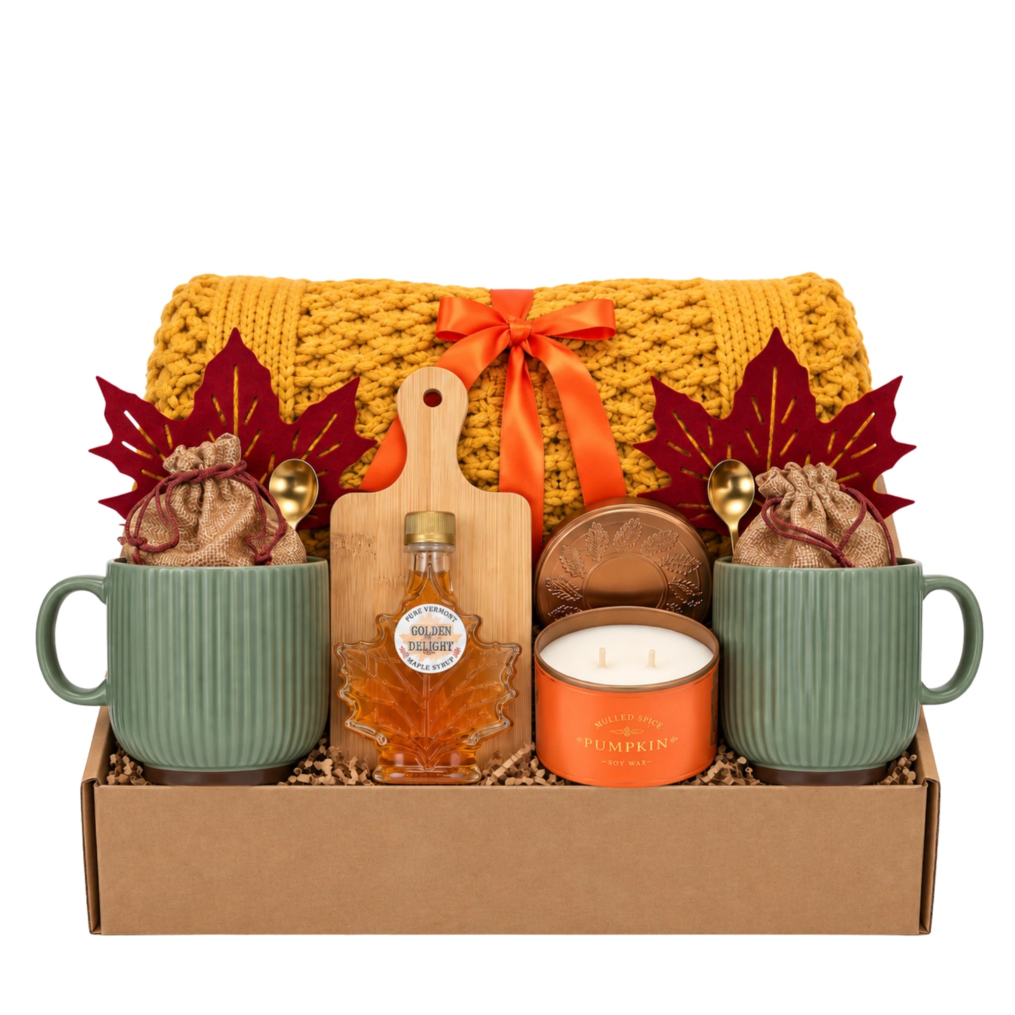Fall Together gift box packed with mustard chunky knit blanket, two sage green ceramic mugs, maple syrup bottle, bamboo serving board, and pumpkin spice candle