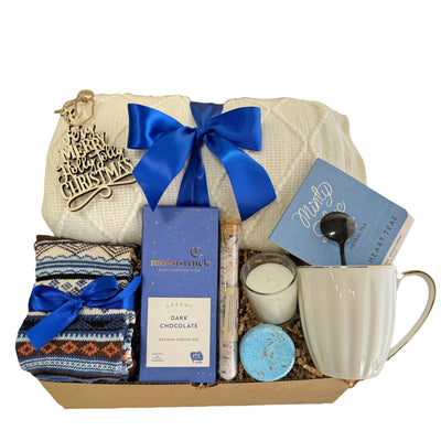 Blue Christmas Gift Box with White Knitted Blanket, blue ribbon and Minty Blue Tea by Arinna Gifts in Dallas