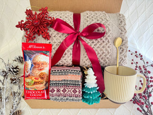 Melt the Snow Gift Box with cozy winter treats and holiday items