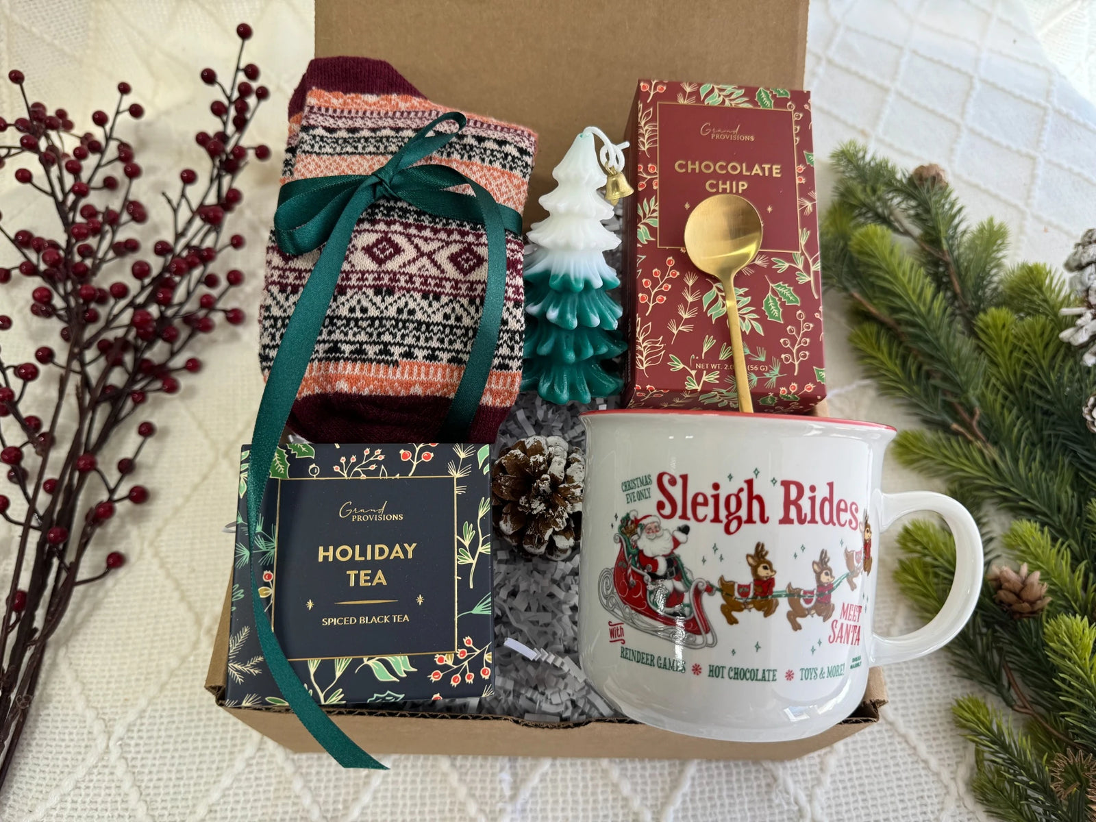 Christmas Time Gift Box with holiday treats and cozy winter items