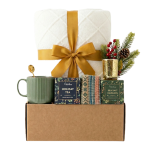 Christmas Treat gift basket with green mug, Nordic socks and gold candle by Arinna Gifts in Dallas
