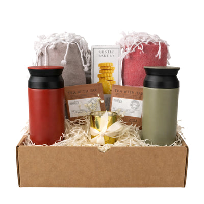 Coastal Escape couple gift box with Turkish cotton beach towels, insulated tumblers, herbal tea, shortbread cookies and candle holder in kraft gift box