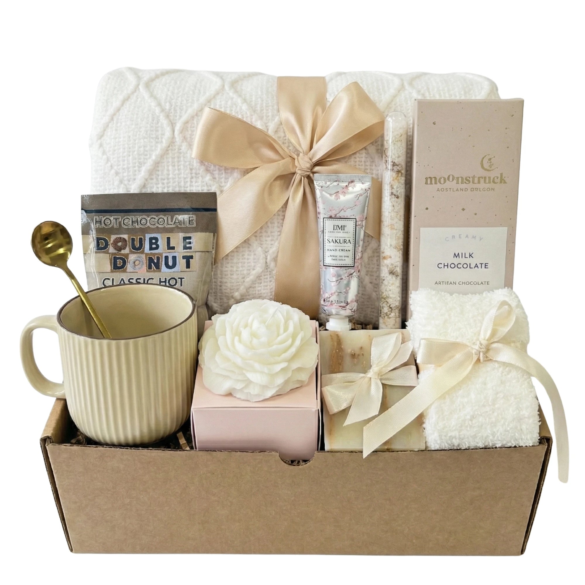 Contentment relaxation gift basket with white blanket, rose candle and chocolate by Arinna Gifts in Dallas