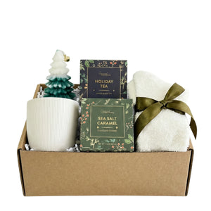 Jingle Bells Christmas gift basket with tree candle, white mug and holiday tea by Arinna Gifts in Dallas