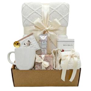 Keep Calm relaxation gift basket with white blanket, mug and spa items by Arinna Gifts in Dallas