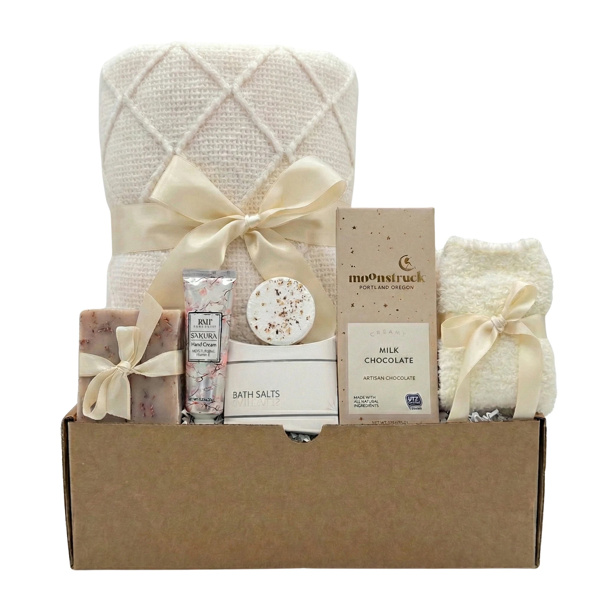 Love and Hugs gift basket with knit blanket, Moonstruck chocolate and spa items by Arinna Gifts in Dallas