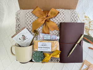 New Adventures Gift Box with journal, blanket, and cozy details
