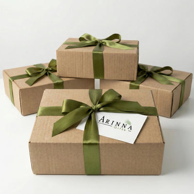 Signature Arinna Gifts luxury packaging with ribbon and logo card for New Adventures Box in Dallas