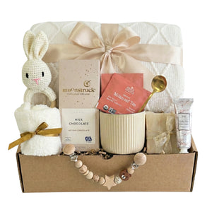 O Baby gift basket with crochet bunny, throw blanket and nursing tea by Arinna Gifts in Dallas