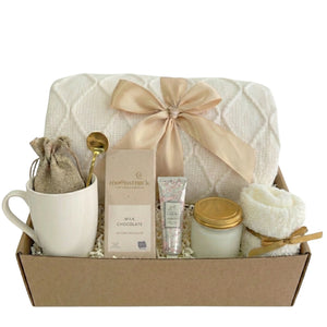 Pure Serenity relaxation gift basket with blanket and mug by Arinna Gifts in Dallas