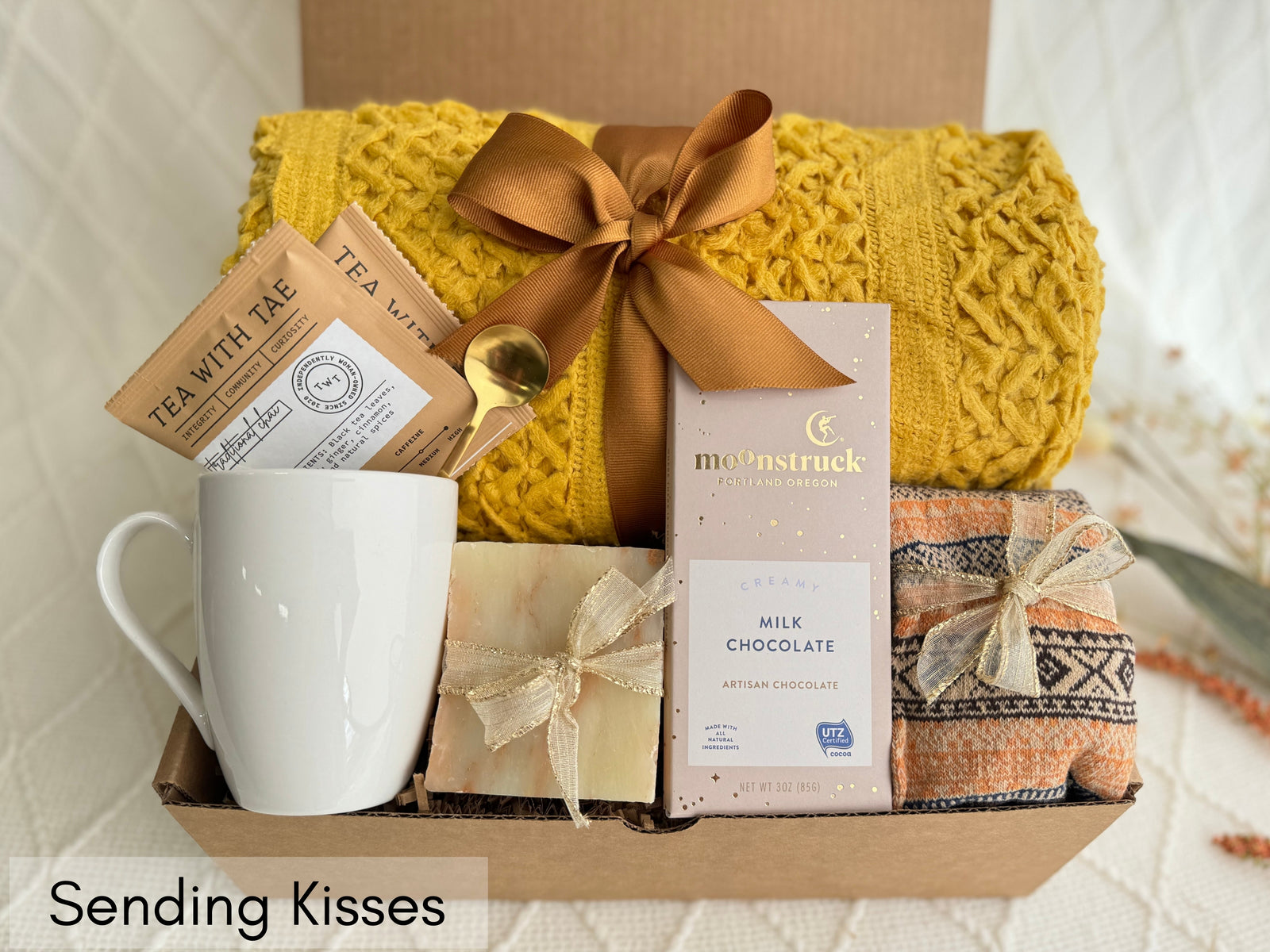 Sending Kisses Gift Box with blanket, tea, chocolate, and cozy accents
