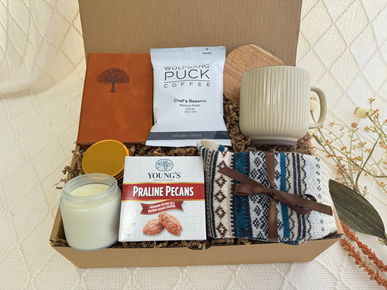 Take a Day Off Gift Box with coffee, socks, candle, and journal
